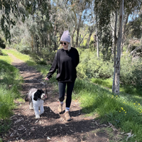 Jessica and her dog Luna on a hike.
