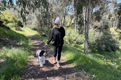 Jessica and her dog Luna on a hike.