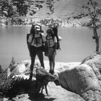 A historical picture of Ruffwear founder Patrick Kruse, his friend, and a dog..